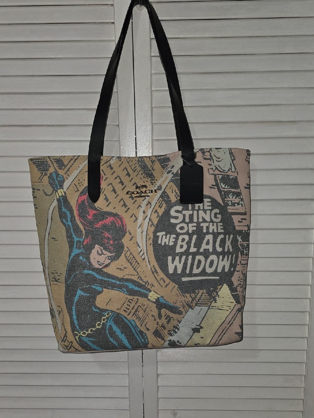 COACH × MARVEL Black Widow canvas tote bag featuring a comic book print